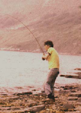 Playing a mullet on fly gear.  Fortunately the sea was flat calm and the weather was warm.