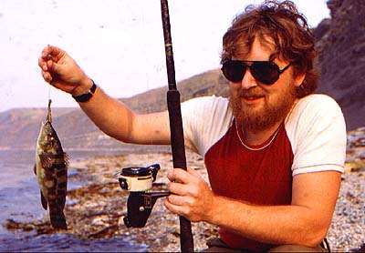 Dave Cooling (a bit younger than today) with a wrasse caught on bait.