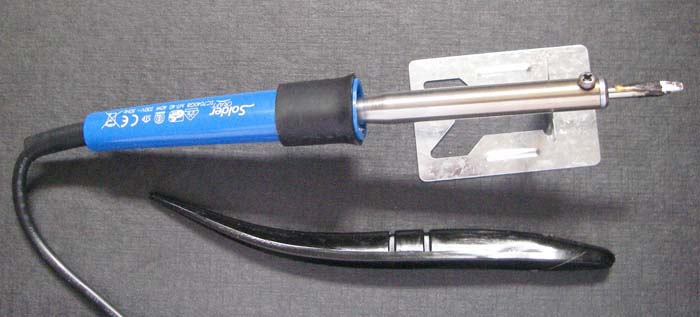 My little soldering iron and a Slug-Go lure ready to be butchered.