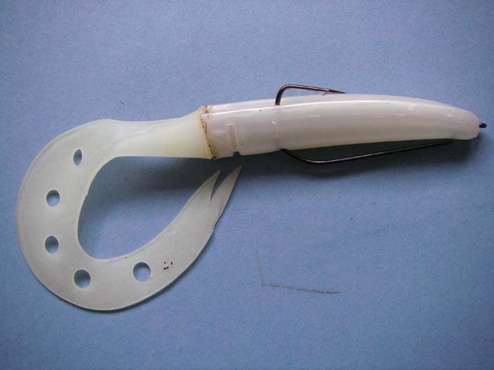 Slandra (Slug-Go + Sandra tail).  All that's needed now is a gentle finger pressure to 'nest' the hook point in the groove and make it completely weedless.